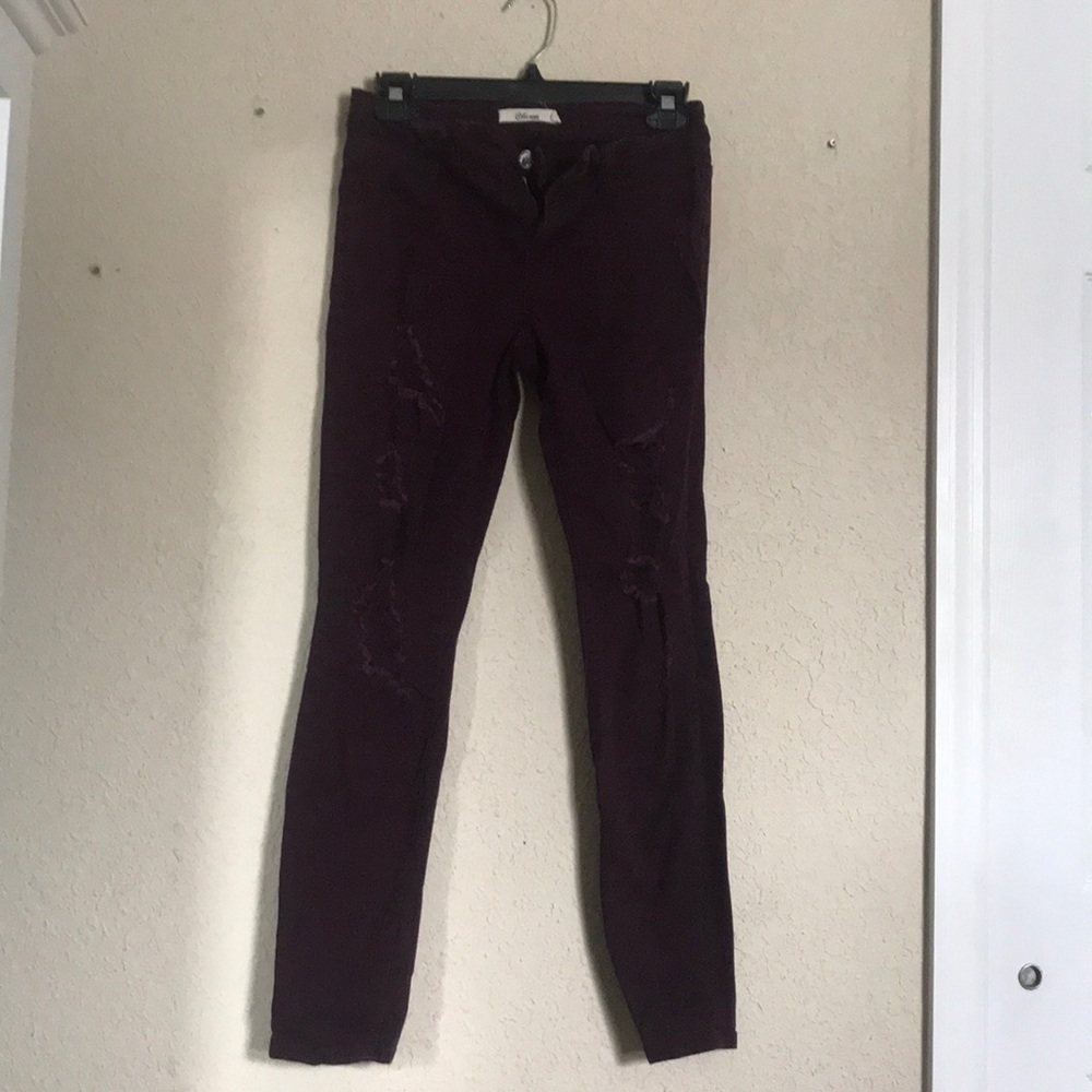 Burgundy distressed jeggings